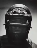 Andreas Feininger, Untitled (man with helmet), 1949, Ferrotyped gelatin silver print, printed later