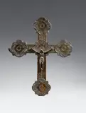 A bronze processional cross, probably North Italian, late 14th century by Probably Northern Italy, late 14th century, Cast and engraved bronze with old patina. The metal mountings over a wooden corpus presumably sheet copper with punched , sold May 2017