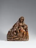 A late 15th century carved wooden Pieta group, presumably Franconian by Probably Franconia, late 15th century, The reverse flattened and hollowed out. No remains of polychromy found. A depiction of the Virgin sitting on a rock, cra, offered May 2017