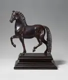 A bronze figure of a pacing stallion by called Giambologna Giovanni di Bologna, Hollow cast bronze on an ebonised wood plinth. Bronze H, sold May 2017