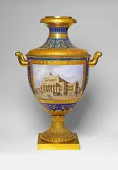 Königliche Porzellanmanufaktur Berlin Kpm, A Berlin KPM porcelain Munich form vase no. 3 with two handles, With ormolu mountings. Comprised of two large porcelain elements, the neck and body with handles held together at the shoulders by a foliate bronze ring. The fluted, screw-mounted bronze base with woven and foliate ornamental bands. Decorated with two large reserves with finely etched bronze frames bearing views of Berlin opera house and Berlin theatre. The section below the handles painted with two gold-green laurel wreaths with Prussian eagles over Neoclassical gold borders. No visible marks, the small wooden panel below the screw hand-inscribed "No. 6". One handle with an older, slightly yellowed restoration. H