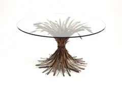 A "gerbe de blé" coffee table by Robert Goossens, A "gerbe de blé" coffee table by Robert Goossens, Cut glass, bronze patinated metal. An identical coffee table in Coco Chanel's apartment in the rue Cambon. Unsigned. H 53, D