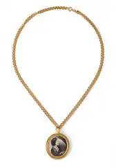 A Chanel medallion de Coco collier, 1985, A Chanel medallion de Coco collier, 1985, Gold plated metal, print after a photograph. The medallion signed: Chanel. Minor dents