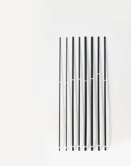 Jorinde Voigt, Institution II, 2010, Installation: 8 pine wood poles, acrylic and Edding (permanent marker)