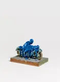 Dieter Roth, Motorradfahrer, 1969, Tin toy, with acrylic paint additions, mounted on wooden plinth. Overall height approx