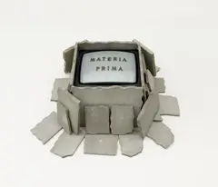 Fabrizio Plessi, Materia Prima, 1989, Video sculpture: television, bronze lettering, stones. Approx