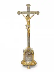Johann Gottlob Jäncke, A large Liegnitz silver crucifix, Worked in partially gilt silver, iron and bronze on a wooden corpus, with régence decor. Engraved to the back of the base with the dedication: "Herr Adam Germanisius, vornehmer, klüger wie auch kö. preus. privileg: Apothecker gaf Gott zu Ehren der Kirchen zu ... (illegible) dieses Crucifix. Verehret 1755 d. 12, Deceber." H
