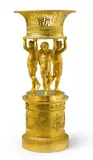 Pierre-François Feuchère, A Parisian empire gilt-bronze table centrepiece, Chased fire-gilt bronze, comprised of several connected parts, the base with a wooden plaque to stabilise the central screw. Designed as a central pierced bowl supported by three putti on a base decorated with winged torches in relief. H