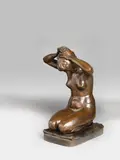 Walter Sintenis, A bronze sculpture of a girl tying her hair, Brown patinated hollow cast bronze with iron supports. Engraved W. Sintenis to the side. H