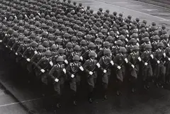 Parade zum 40. Jahrestag der DDR, Ost-Berlin (Parade on the 40th anniversary of the GDR, East-Berlin) by Barbara Klemm, 1989, Gelatin silver print, printed c., sold Nov 2015