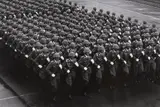 Parade zum 40. Jahrestag der DDR, Ost-Berlin (Parade on the 40th anniversary of the GDR, East-Berlin) by Barbara Klemm, 1989, Gelatin silver print, printed c., sold Nov 2015