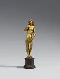 South German second half 16th century, A South German fire gilt bronze figure of Eve in paradise, second half 16th century., This figure of Eve would have been accompanied by a figure of Adam to form a group representing the original sin. The small bronze is highly similar to a piece by the Nuremberg goldsmith Hans Kellner (active 1582 - 1609) from a table centrepiece formed as the garden of paradise kept in the Bayerisches Nationalmuseum in Munich, indicating that this work was possibly also manufactured in Nuremberg. One finger lost, otherwise in good condition. Mounted on a modern wooden socle