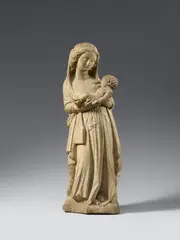 Northern France circa 1370 & 1380, A Northern French carved limestone figure of the Virgin and Child, circa 1370/1380., Carved in the round, the reverse only summarily carved and partially flattened. Very minor remains of former polychromy.. A particularly finely carved figure of the Virgin designed for a frontal and slightly lowered viewpoint. The Madonna stands in contrapposto and leans back at the waist. She holds the Child in both hands to Her breast and looks down at Him tenderly. The sculpture is characterised by the detailed carving of the Virgin's hair and clothing. She wears a girdle book around Her belt and Her gown and cloak are draped to fall in a harmonious pattern of vertical folds to the ground or are held beneath Her arms forming cascades of sinuously curving seams at her sides. The front left corner of the plinth and fingers of the Child's left hand lost. With minimal wear throughout