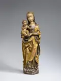 Probably Central Germany circa 1500 & 1510, A presumably Central German carved wooden figure of the Virgin and Child, circa 1500/1510., The reverse flattened. With older, partially overpainted polychromy.. A full-figure depiction of the Virgin standing on the crescent moon, designed for a frontal and slightly lowered viewpoint. She holds the nude Christ Child over Her hip with Her right hand. The sculpture's composition is largely defined by the rich interplay of compressed and vertical folds and the curving seams of the golden cloak drawn across the Virgin's body. The Child's arms and the right tip of the crescent moon lost. Wear with losses to the polychromy