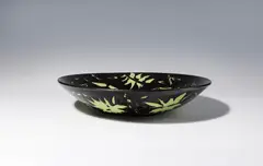 Roman Scheidl, Plate, ceramics made of light shards, glazed in green and black