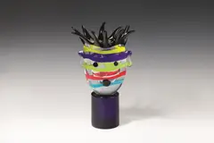 Multi Stripe Head by Kiki Kogelnik, 1995, glass, sold Jun 2026