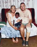 Pieter and Maryna Vermeulen with Timana Phosiwa by Pieter Hugo, 2006, C-Print, sold Oct 2019