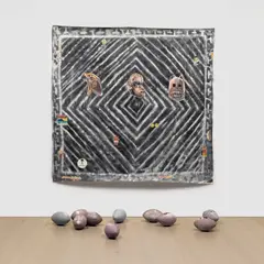 Paulo Nimer Pjota, Black Painting part. 1, 2017, acrylic on unstretched canvas and resin footballs, in 11 parts