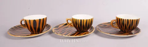 John Ffrench, CUP & SAUCER/PLATE 'NIGHT-CAP' SET, 1962 (SET OF SIX), hand-painted ceramic; cup; (3); saucer; (3)