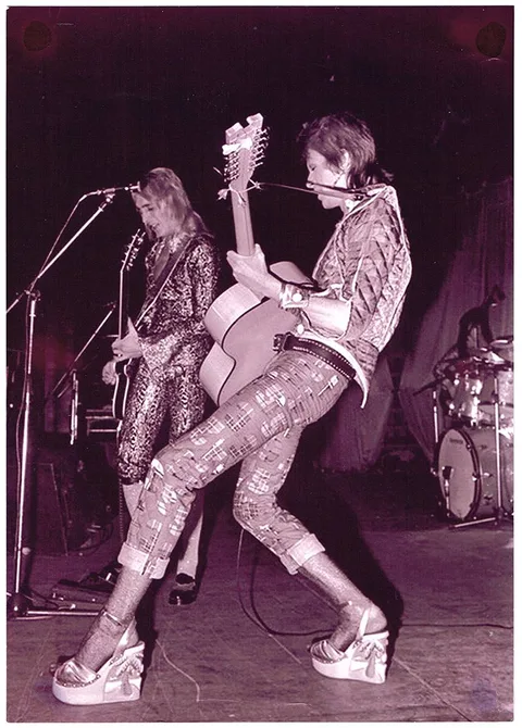 Mick Rock, DAVID BOWIE AND MICK RONSON, OXFORD TOWN HALL 1972., photograph