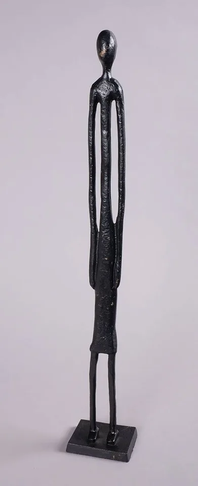 Irish School, STANDING FIGURE, painted bronze