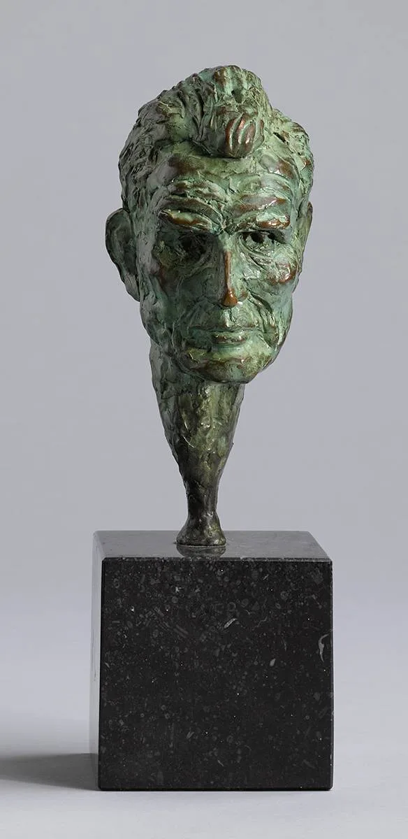SAMUEL BECKETT by John Coll, bronze on black marble base, sold Mar 2024