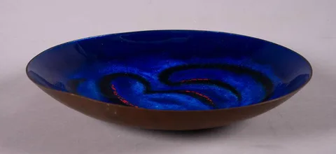 Pádraig Ó Mathúna, BLUE AND RED BOWL, beaten copper with blue and red enamel interior