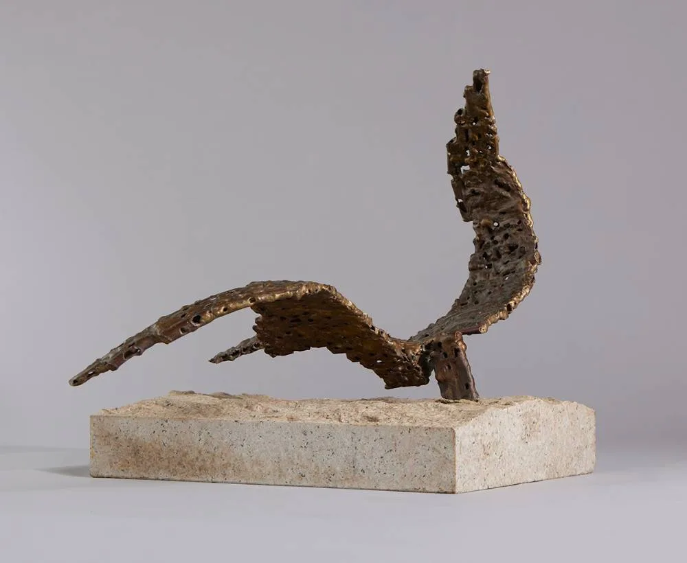 BIRD IN FLIGHT by John Behan, bronze on Connemara marble; (unique), sold Oct 2023