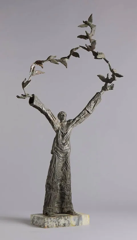 SAINT FRANCIS AND THE BIRDS by John Behan, bronze on marble base; (unique), sold Oct 2023