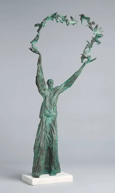 SAINT FRANCIS AND THE BIRDS by John Behan, bronze on white marble base, sold May 2023