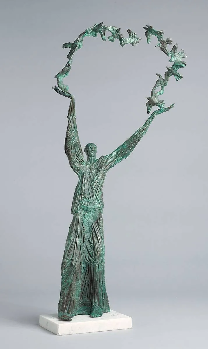 SAINT FRANCIS AND THE BIRDS by John Behan, bronze on white marble base, sold May 2023