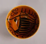 John Ffrench, BLACK AND AMBER BOWL WITH FISH DESIGN