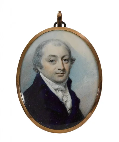 George Engleheart, A GENTLEMAN, WEARING BLUE COAT, WHITE COAT, FRILLED CHEMISE, STOCK AND CRAVAT, HIS HAIR POWDERED, miniature; (gold frame, the reverse glazed to reveal plaited hair); (oval)