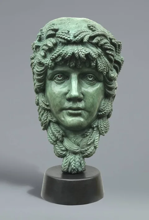 Rory Breslin, THE GUINNESS MASK, bronze with stainless steel; (no. 1 from an edition of 5)