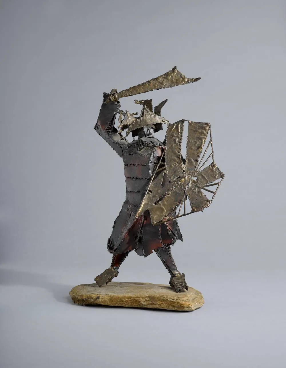 CHINESE WARRIOR by John Behan, welded bronze on stone base, sold Oct 2020