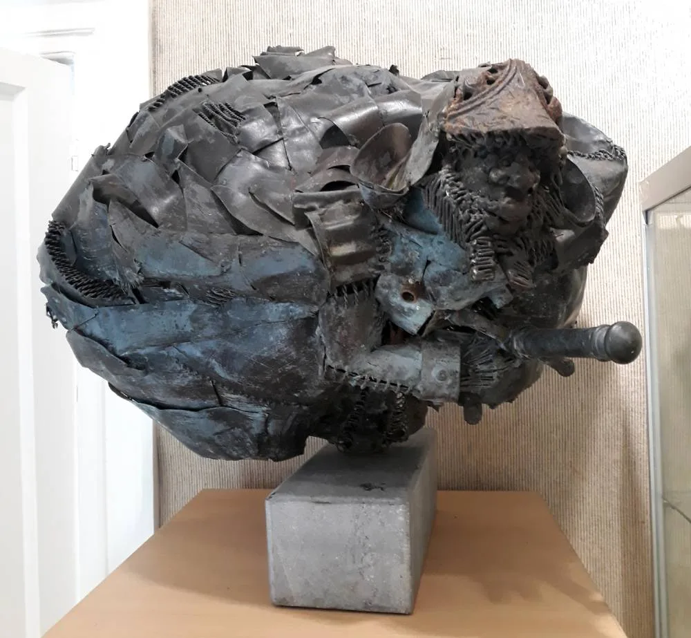 THE WARRIOR by Vincent Browne, welded metal and bronze on stone base, offered Jul 2018