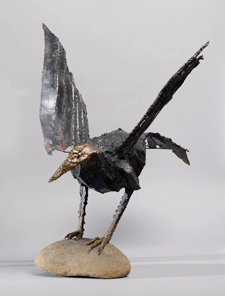 BIRD by John Behan, bronze on stone base with fossilised fish, sold Oct 2017