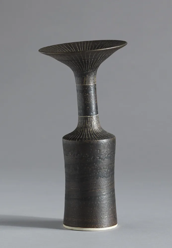 PORCELAIN BOTTLE by Lucie Rie, c.1960, porcelain coated with manganese, sold Sep 2016