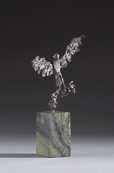 SILVER BIRD by Edward Delaney, silver on green marble base, sold Dec 2012