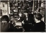 Gisèle Freund, JAMES JOYCE WITH ADRIENNE MONNIER AND SYLVIA BEACH IN SHAKESPEARE AND CO. BOOKSHOP, MAY 1938