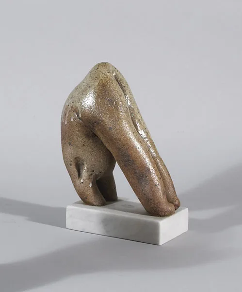 FIGURE IN DOWNWARD FACING POSE by Pat Connor, 1978, ceramic on white marble base, offered May 2012