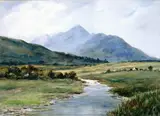 Douglas Alexander, A VIEW ALONG A RIVER, WITH COTTAGES IN THE MID-DISTANCE AND MOUNTAINS RISING IN THE BACKGROUND