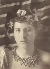 Wilhelm von Gloeden, Young man with a wreath of flowers, Albumen print