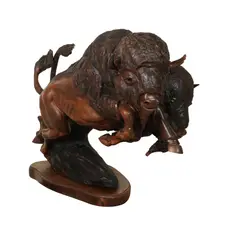 Bison by J. Chester (Skip) Armstrong, 1994, carved wood, sold Aug 2025