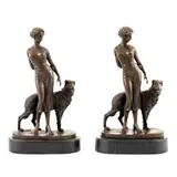 Josef Lorenzl, Lot format din două sculpturi similare - suporți pentru cărți, reprezentând un personaj feminin pozând relaxat, alături de câinele său, antimoniu