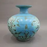 Graeme Storm, Floor vase, stoneware with carved slip floral decoration, matt turquoise glaze with dark brown negative detail