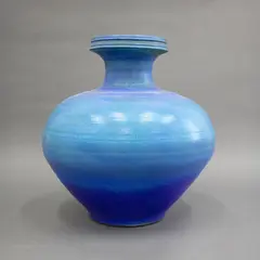 Floor vase by Graeme Storm, stoneware with blue barium glaze, sold Sep 2026
