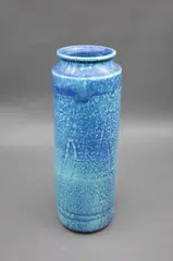 Potter Unknown, Tall cylinder vase, porcelain with mottled blue glaze