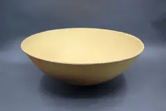 Len Castle, Sulphurous bowl, earthenware with matt yellow thinly crackle glaze, fading to matt black to the exterior