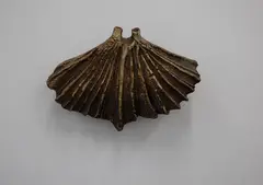 Len Castle, Winged hanging form, ochre washed stoneware with double aperture